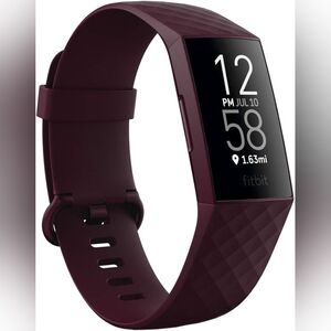 Fitbit Charge 4 like new with purple strap